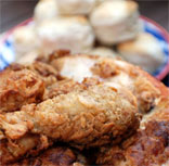 Celebrate Independence Day with crisp, moist fried chicken, fluffy buttermilk biscuits, and a spectacular heirloom tomato salad.