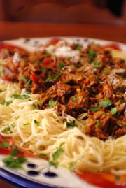 Angel Hair Pasta with Sun Dried Tomatoes and Golden Chanterelle mushrooms appetizer recipe. By Beyond Wonderful Mushroom Expert, Charmoon Richardson.