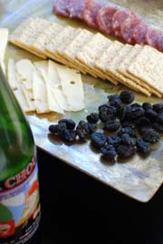 Cheese and Beer Pairing appetizer cheese trays: Fol Epi Cheese and La Chouffe Ale. Mark "The Cheese Dude" Todd, Beyond Wonderful Cheese Dude.