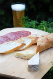 Cheese and Beer Pairing appetizer cheese tray. Pont l&rsquo;Ev&ecirc;que Cheese and Hennepin Belgian Farmhouse Saison Beer. Mark "The Cheese Dude" Todd. 