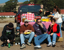 Family tailgating lunch next to the Golden Gate Bridge in San Francisco.