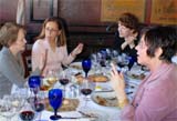Alice Waters discusses the Edible Schoolyard program with guests at the Cooks with Books event at the Boulevard restaurant in San Francisco.