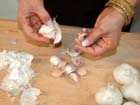 How to cooking techniques—How to peel garlic.