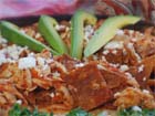 Finished dish of Mexican chilaquiles roja.
