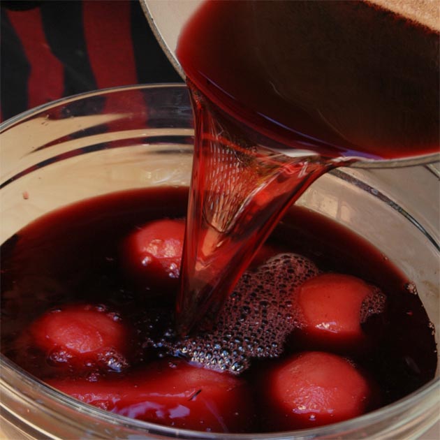 Preparintg poached pears for refrigeration.