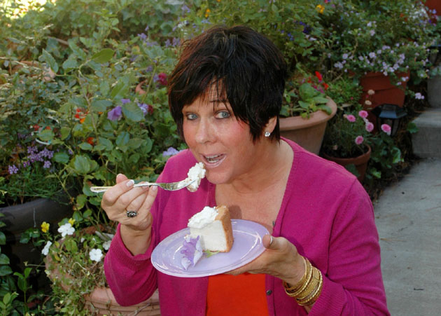 Barbara Adams eating angel food cake.