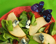 Quick and easy pear salad with blue cheese, toasted nuts, and walnut dressing recipe