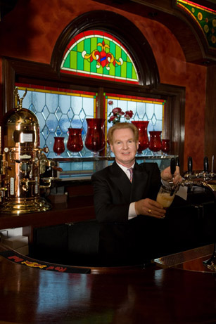 Myles O'Reilly tending bar at O'Reilly's Holy Grail Irish restaurant in San Francisco, CA